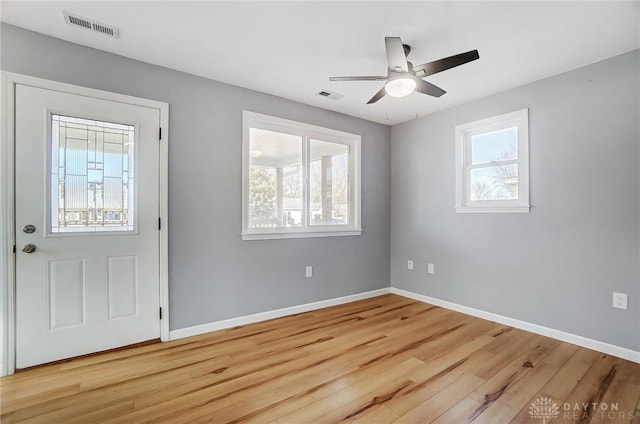 entryway with ceiling fan and light wood-type flooring