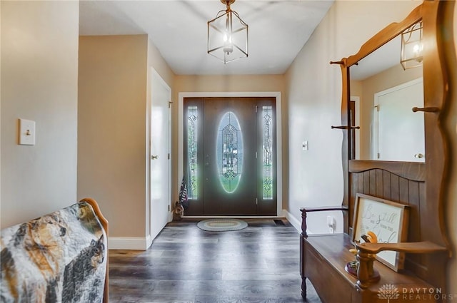 foyer with dark wood-type flooring