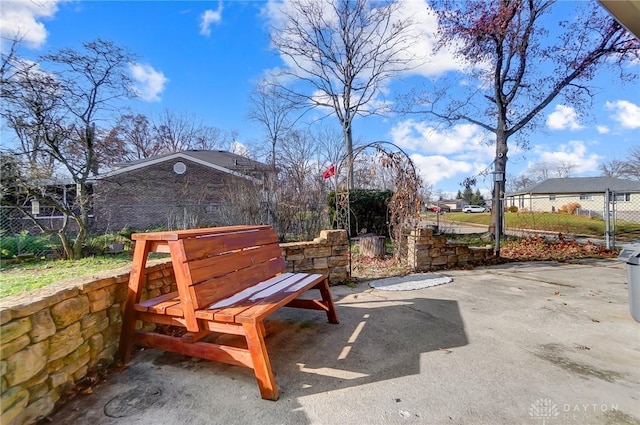 view of home's community with a patio