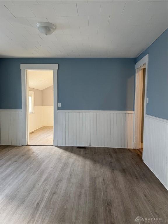 empty room featuring hardwood / wood-style floors