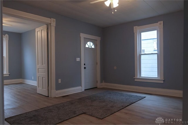 entryway featuring hardwood / wood-style flooring and ceiling fan