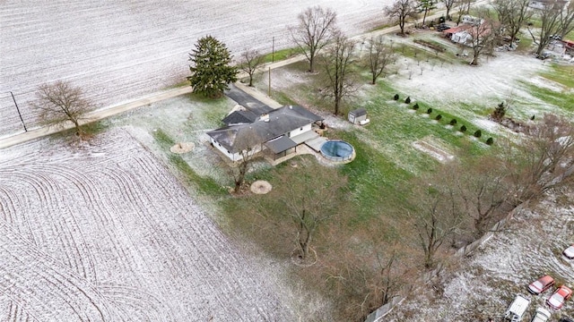 birds eye view of property with a rural view