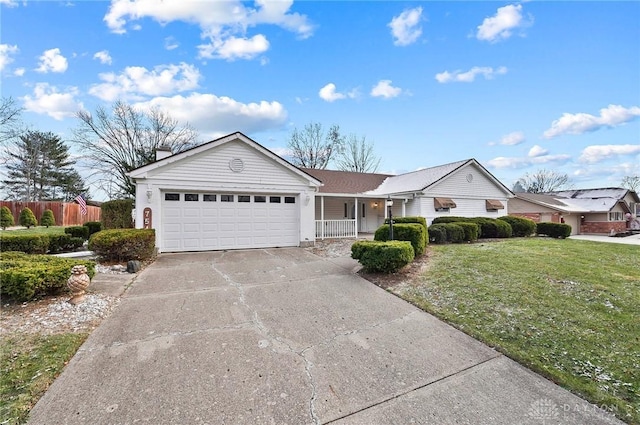 ranch-style house with a front lawn and covered porch