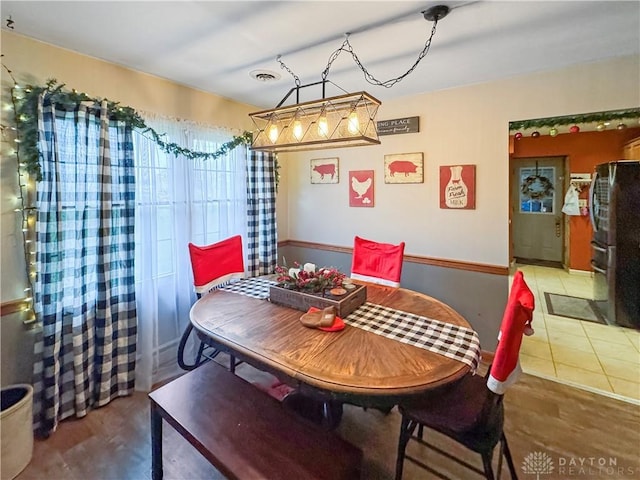 dining room featuring tile patterned flooring