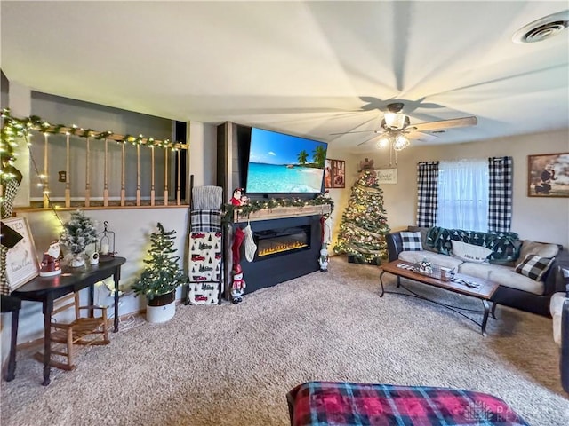 living room with carpet flooring and ceiling fan