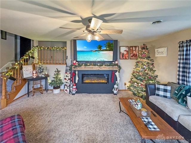 living room featuring carpet floors and ceiling fan