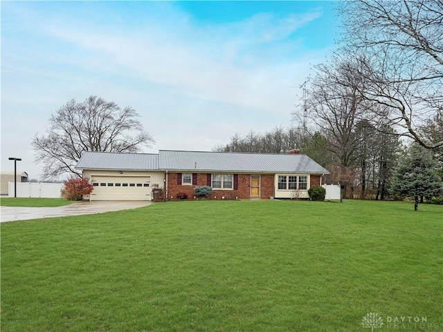 ranch-style house with a front yard and a garage