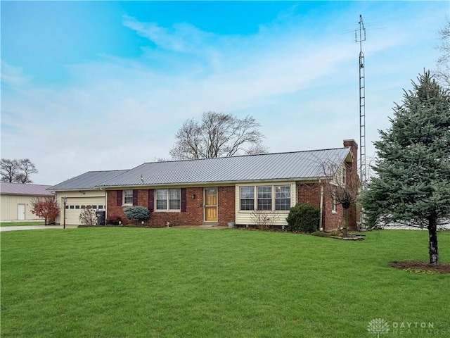 ranch-style home with a front yard and a garage