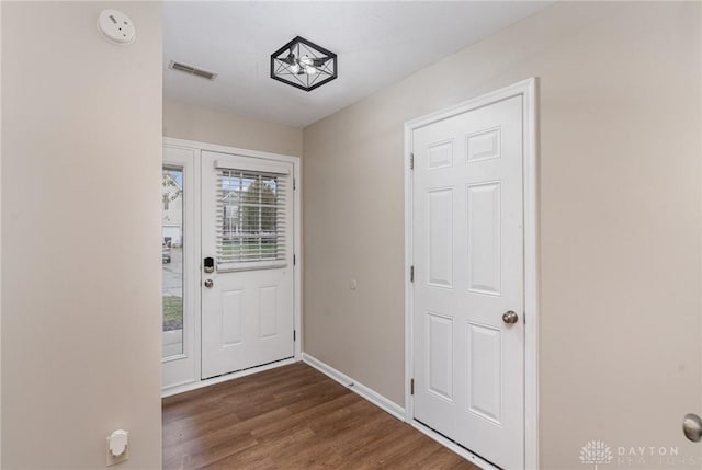 entryway featuring dark wood-type flooring