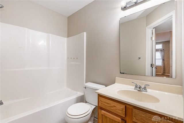 full bathroom with vanity, toilet, and shower / washtub combination