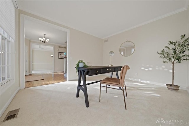 carpeted home office with an inviting chandelier and crown molding