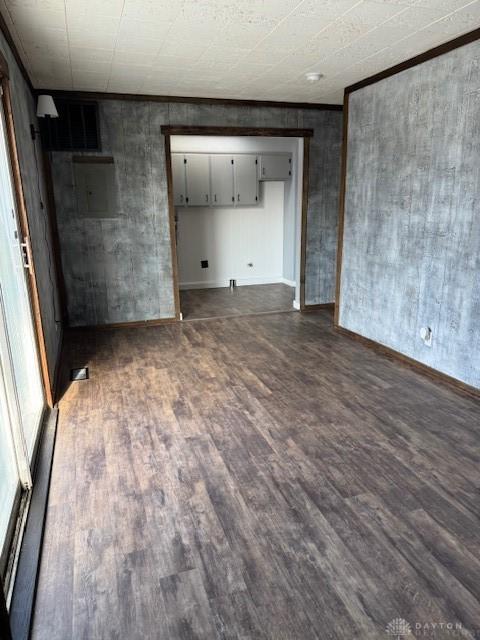 unfurnished living room featuring dark hardwood / wood-style floors