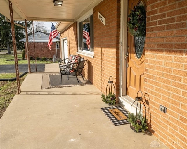 view of patio featuring a porch