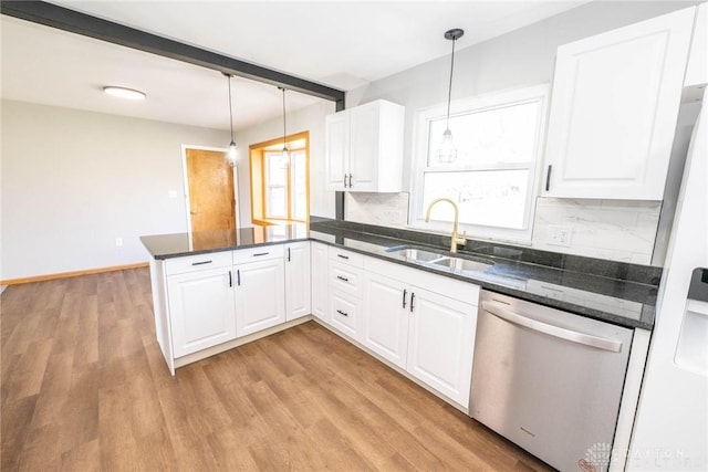 kitchen with white cabinetry, dishwasher, sink, and pendant lighting