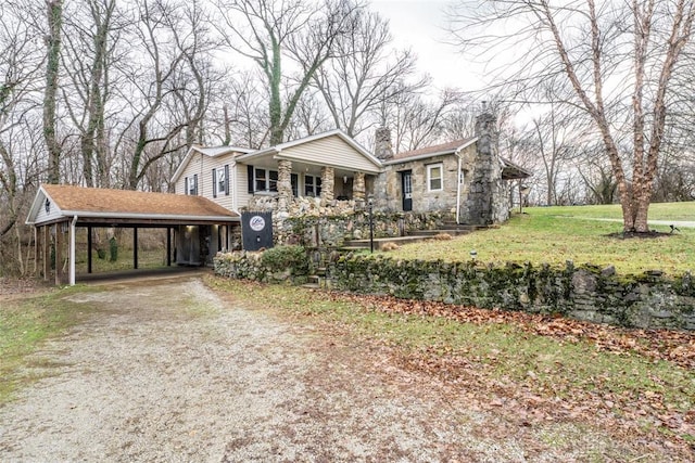 view of front facade with covered porch and a front lawn