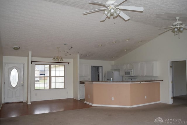 kitchen with a textured ceiling, white cabinetry, ceiling fan, and white appliances