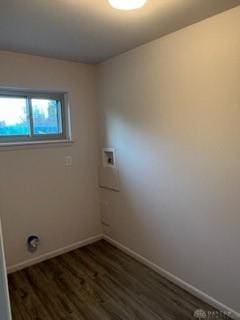 laundry room with dark wood-type flooring and hookup for a washing machine