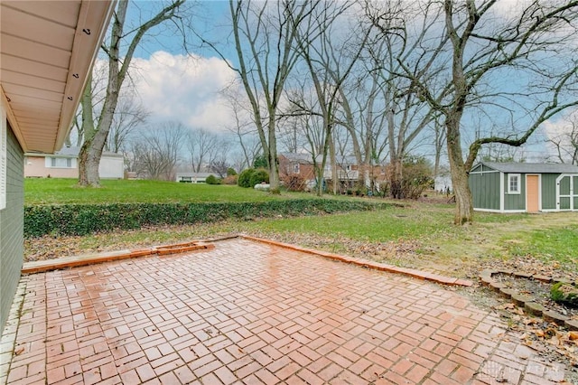 view of patio featuring a storage unit