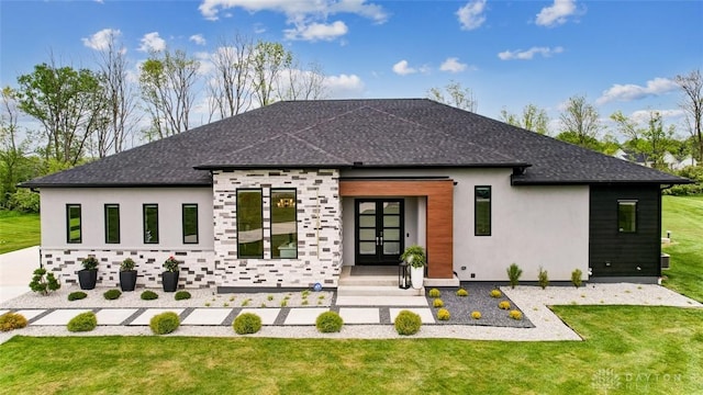 back of house with a lawn and french doors