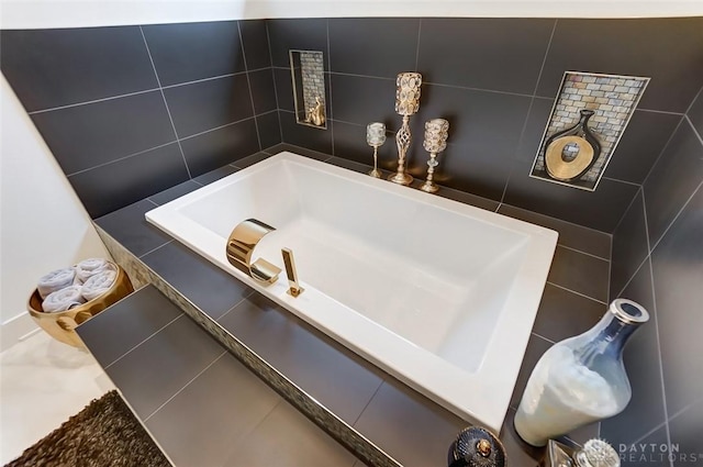 bathroom featuring tile walls