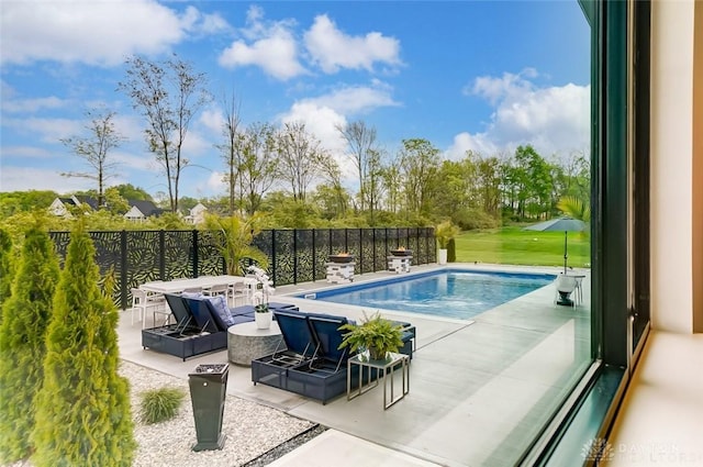 view of pool featuring a patio area