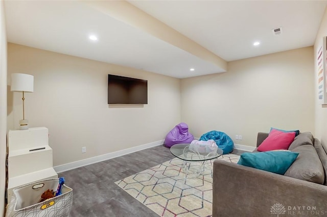 sitting room with wood-type flooring