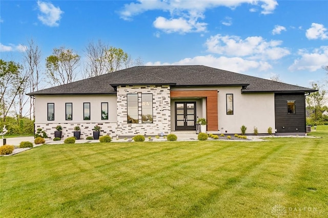 rear view of house featuring a yard and french doors