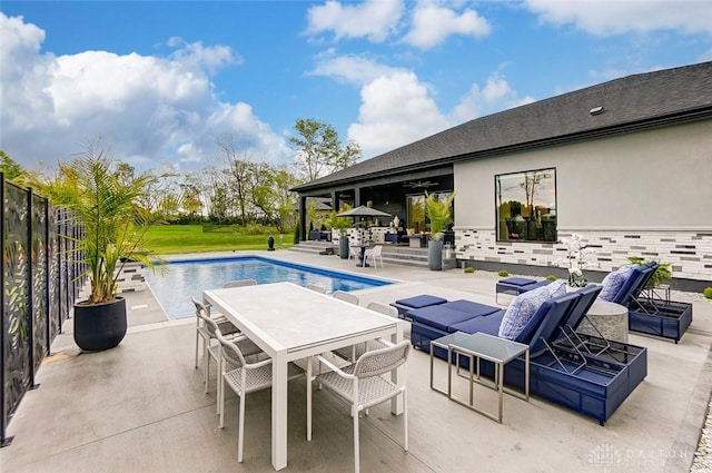 view of swimming pool with a patio