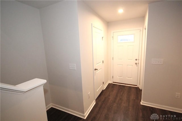 hall featuring dark wood-type flooring