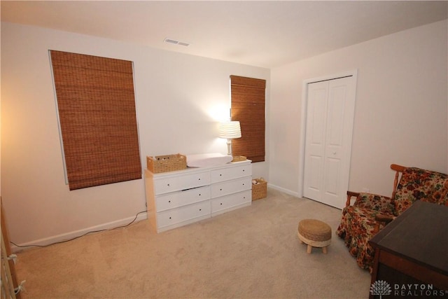 sitting room with light carpet