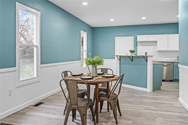 dining area featuring light hardwood / wood-style floors