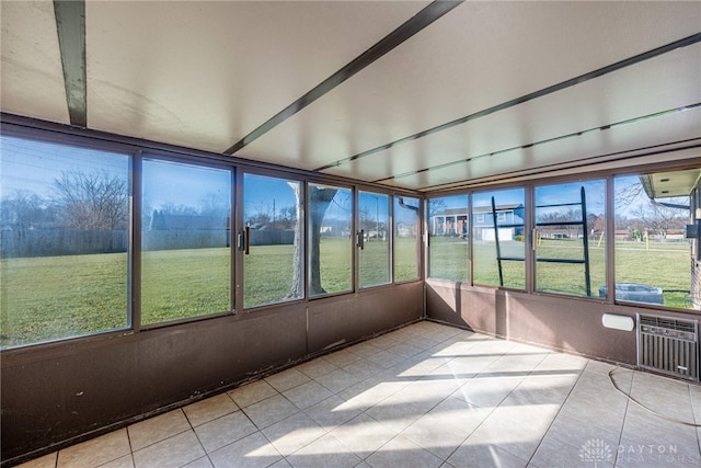 unfurnished sunroom with a wealth of natural light