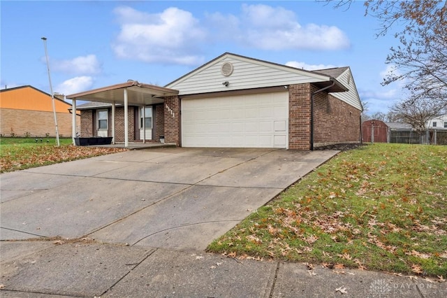 single story home with a garage and a front lawn