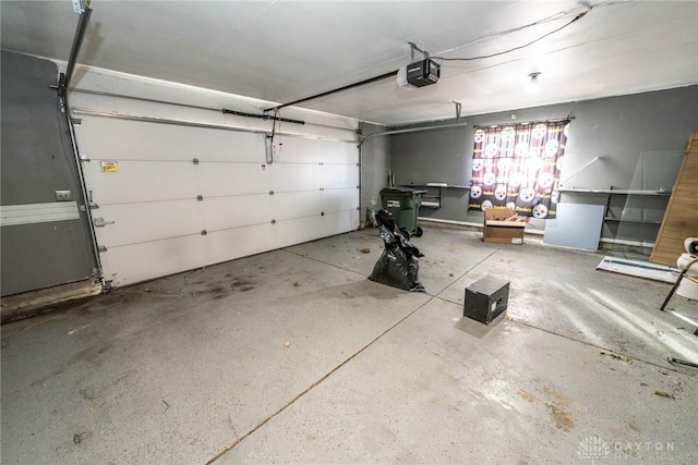 garage featuring a garage door opener