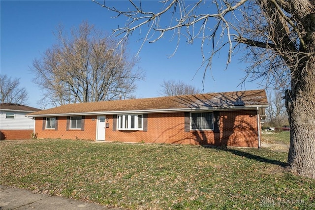 view of front facade featuring a front yard