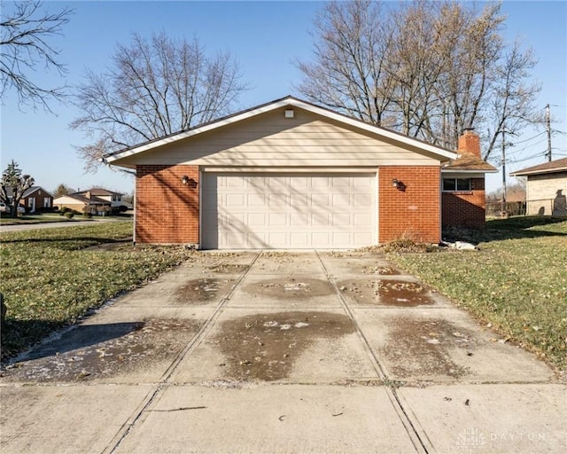 garage with a lawn