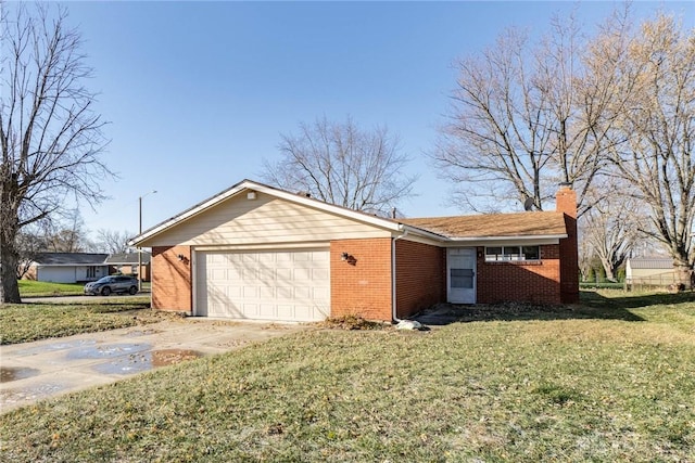 view of side of home with a lawn and a garage