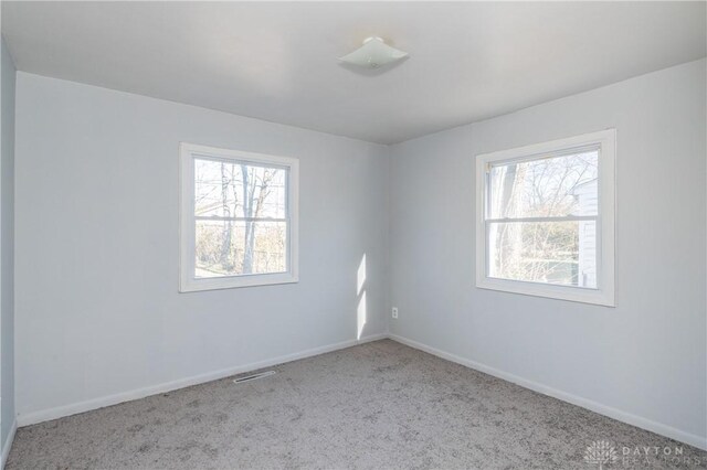 view of carpeted spare room