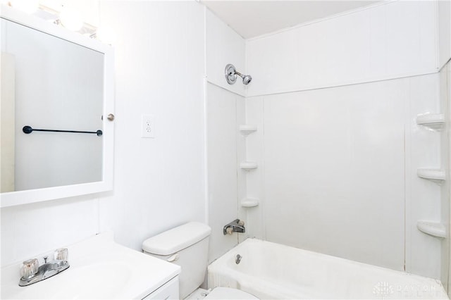 bathroom featuring bathing tub / shower combination, toilet, and vanity