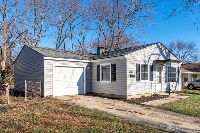 view of property exterior with a garage