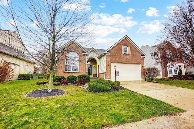 view of front property featuring a garage and a front lawn