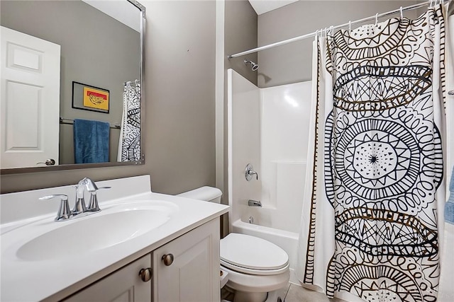 full bathroom featuring tile patterned floors, vanity, toilet, and shower / bath combo