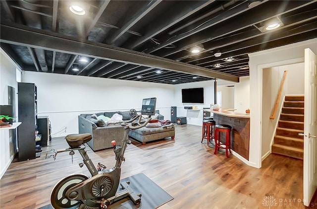 workout room featuring hardwood / wood-style floors