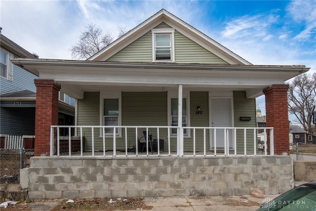 view of front of property featuring covered porch