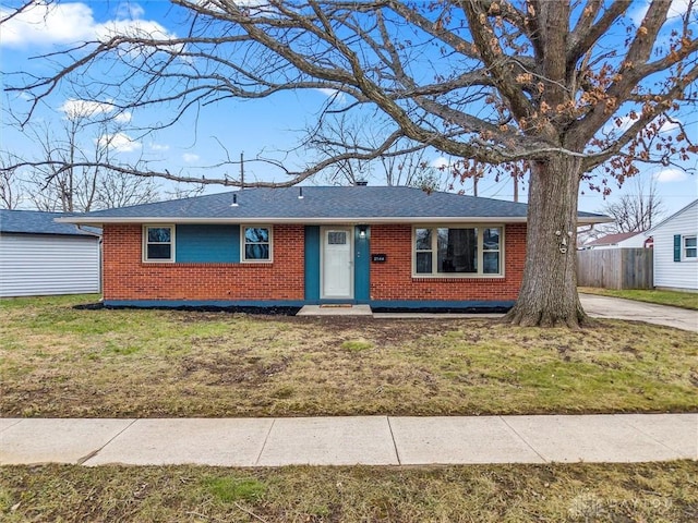 ranch-style home with a front yard