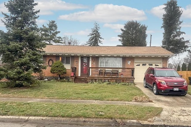 single story home with a front yard and a garage