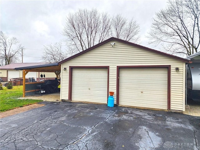 garage with a carport