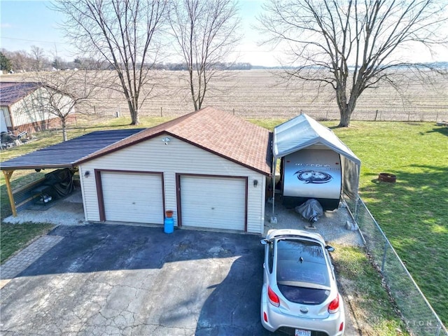 exterior space with a carport and a rural view