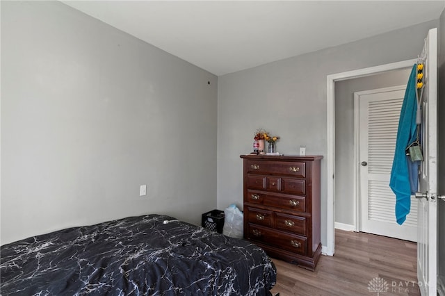 bedroom featuring hardwood / wood-style floors