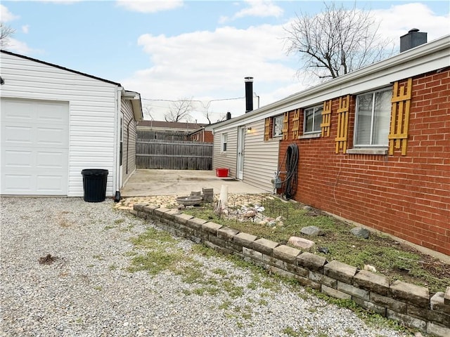 view of property exterior featuring a garage